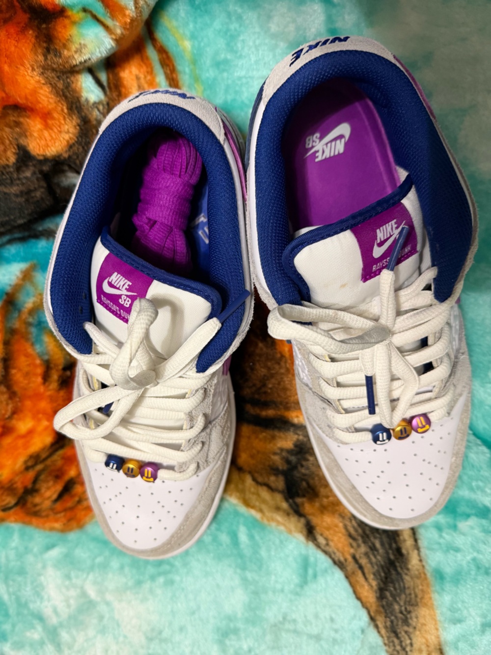 Nike Women’s White Sneakers with Purple and Blue Accents